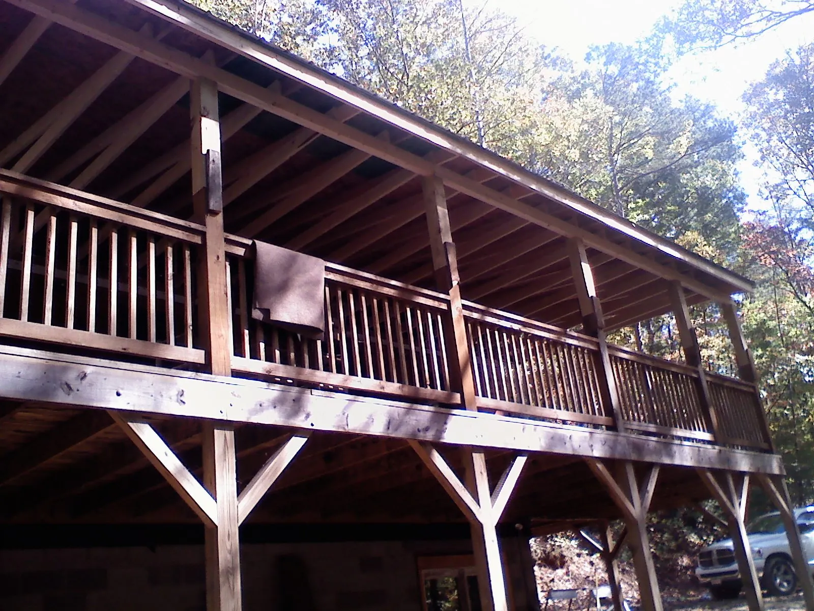 Timber framing under a new elevated porch and deck — Roof Leak Repair in Marble by Roofing Brothers